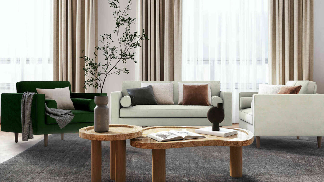 Modern living room with Article Sven sofa in Performance Weave Stone and Classic Velvet Forest Green slipcover