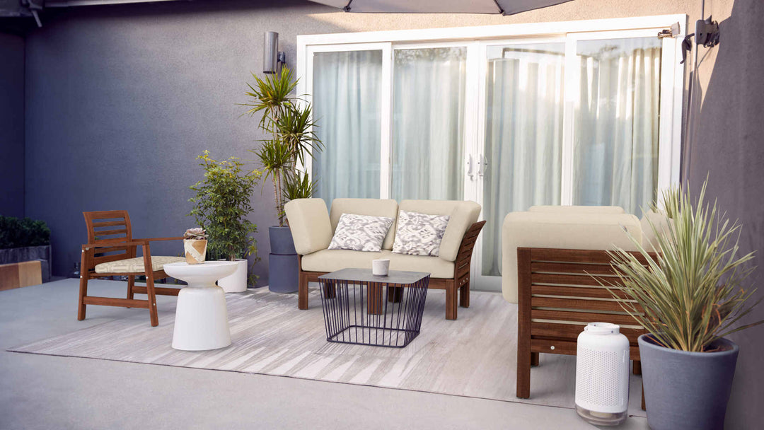 Patio with IKEA Applaro sofa in Performance Knit Natural and Sunbrella Fretwork Pewter slipcover