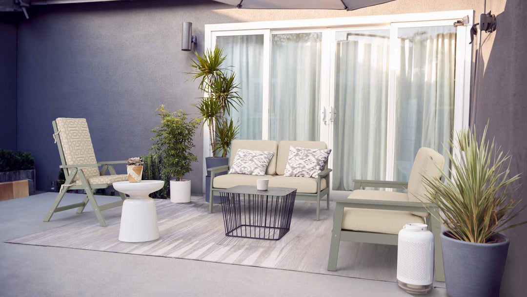Patio with IKEA Bondholmen sofa in Performance Knit Natural and Sunbrella Fretwork Pewter slipcover