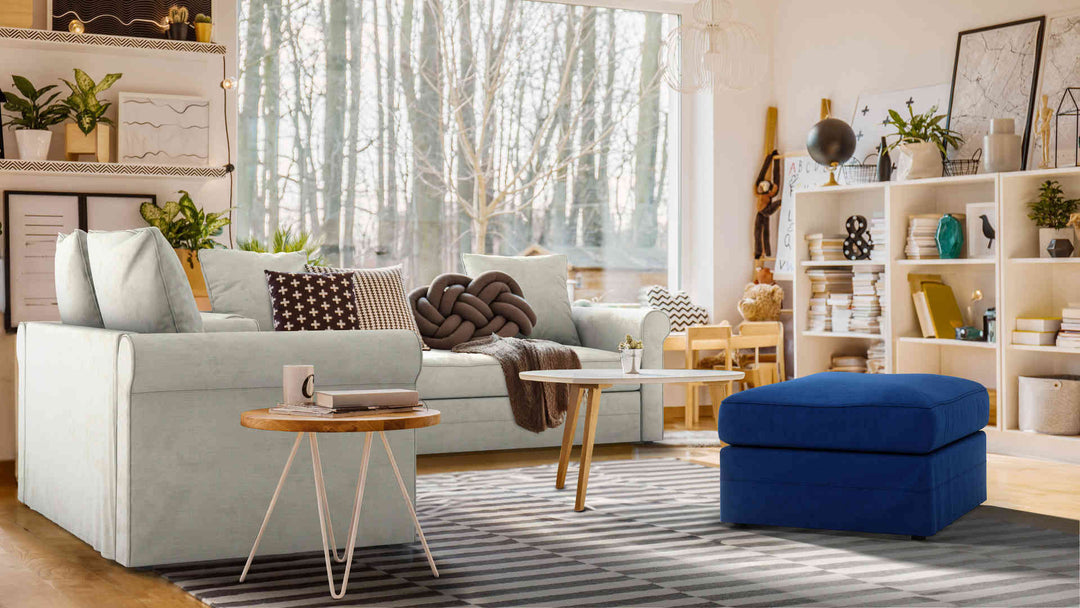Bohemian living room with IKEA Harlanda sofa in Performance Weave Stone and Classic Velvet Cobalt slipcover