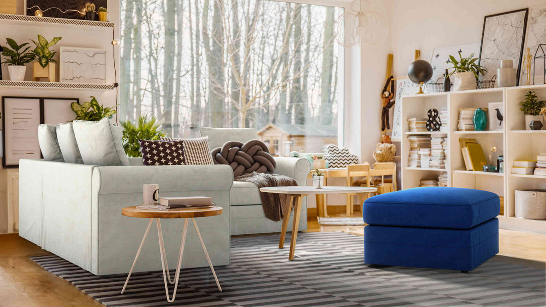 Bohemian living room with IKEA Harlanda sofa in Performance Weave Stone and Classic Velvet Cobalt slipcover