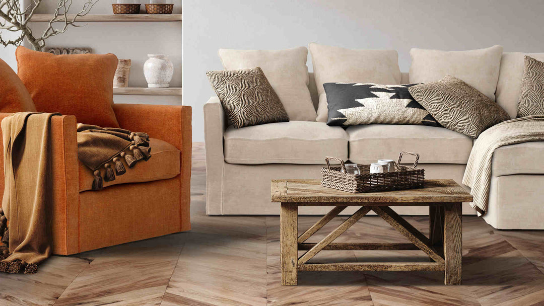 Rustic living room with IKEA Harnosand sofa in Performance Weave Cream and Comfort Chenille Burnt Orange slipcover