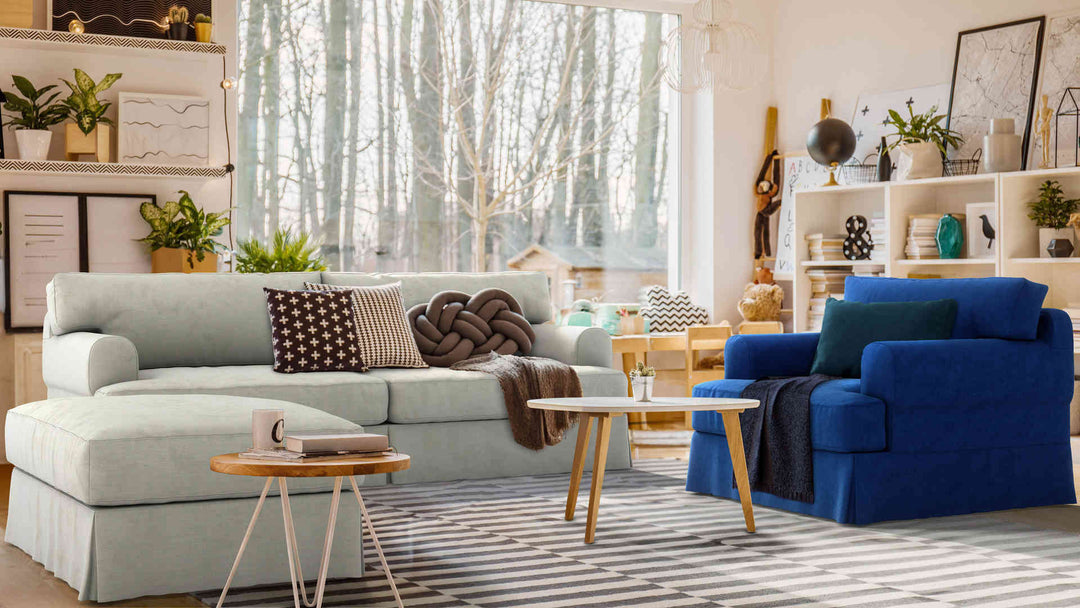 Bohemian living room with IKEA Hovas sofa in Performance Weave Stone and Classic Velvet Cobalt slipcover