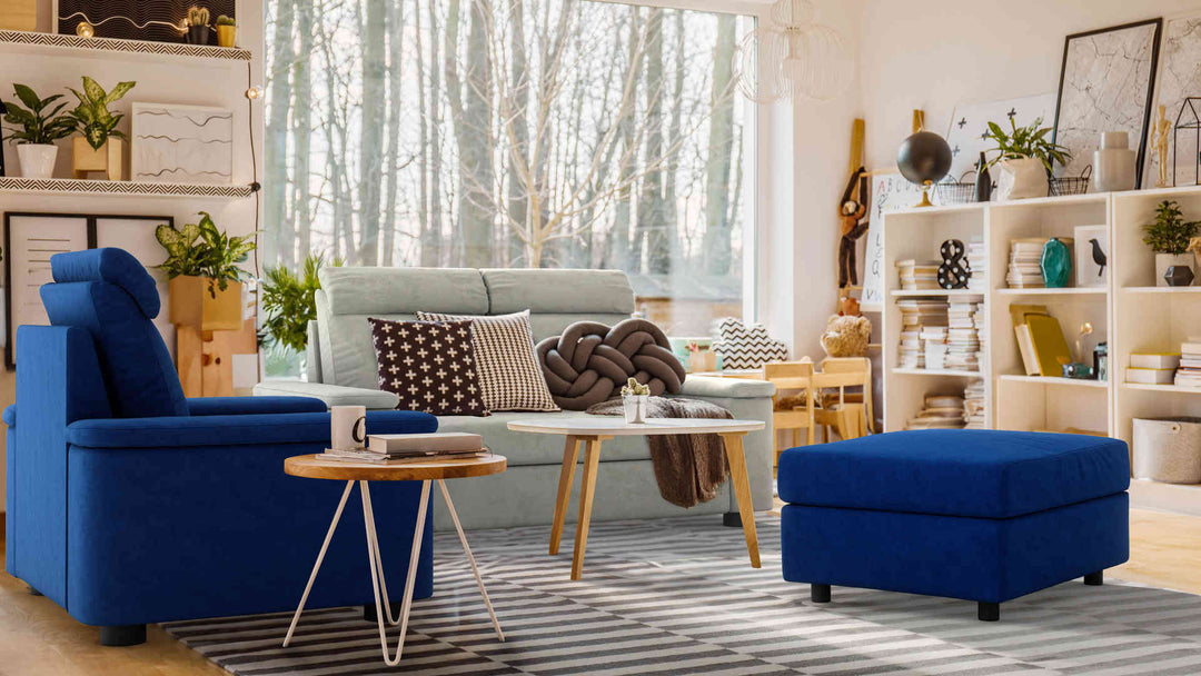 Bohemian living room with IKEA Lidhult sofa in Performance Weave Stone and Classic Velvet Cobalt slipcover