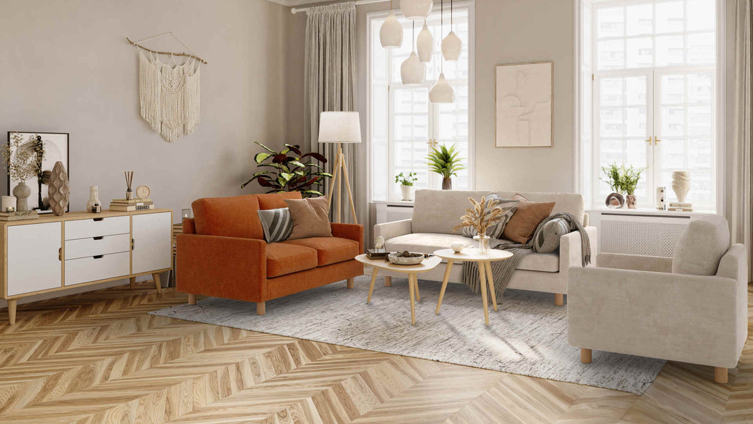 Scandinavian living room with Muji Slim Arm Sofa in Performance Weave Cream and Comfort Chenille Burnt Orange slipcover