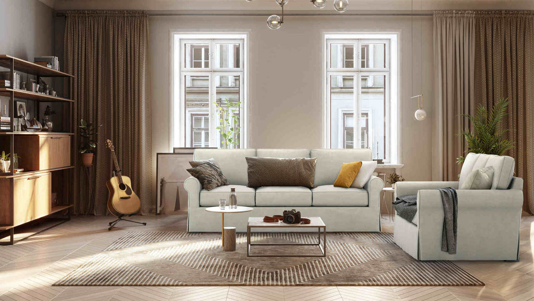 Scandinavian living room with Pottery Barn Buchanan Roll Arm sofa in Performance Weave Stone slipcover
