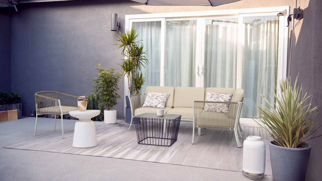 Patio with IKEA Segeron sofa in Performance Knit Natural and Sunbrella Fretwork Pewter slipcover