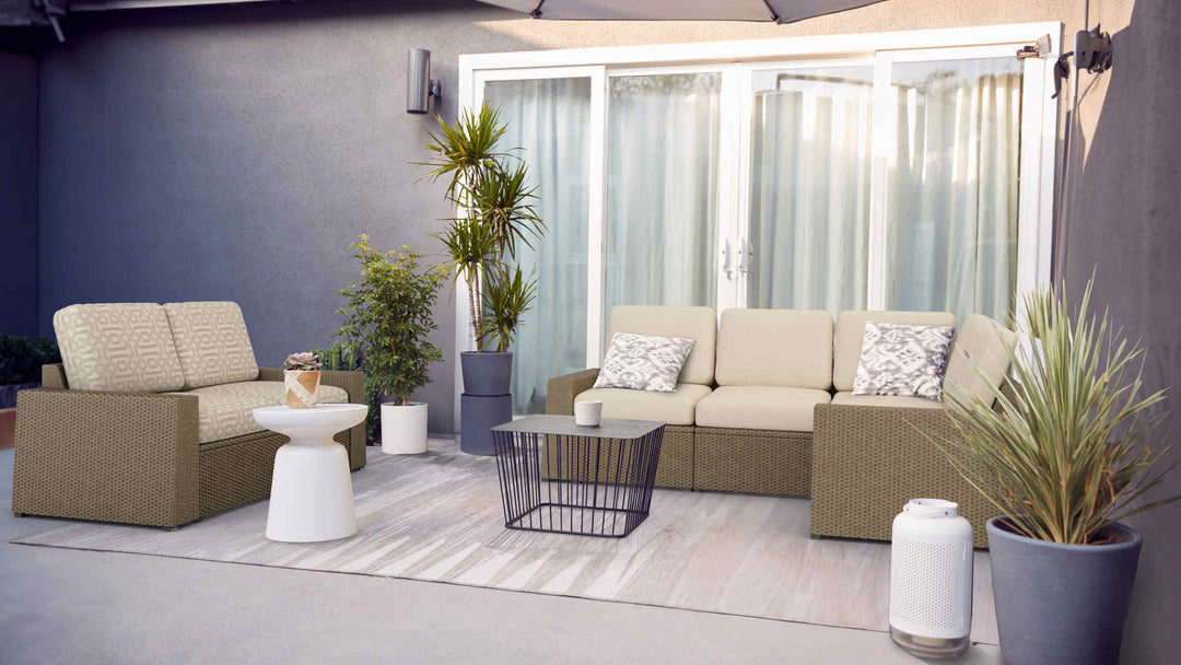 Patio with IKEA Solleron sofa in Performance Knit Natural and Sunbrella Fretwork Pewter slipcover