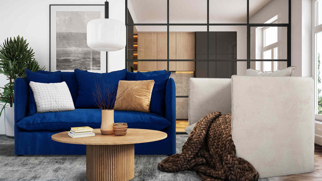 Modern living room with IKEA Solsta sofa in Classic Velvet Cobalt and Performance Weave Stone slipcover