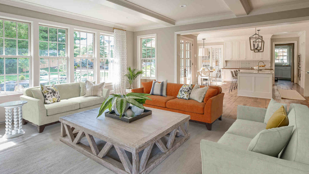 Rustic living room with Pottery Barn Greenwich sofa in Comfort Chenille Burnt Orange and Performance Weave Stone slipcover