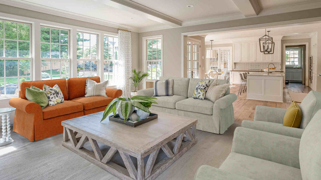 Rustic living room with Pottery Barn Pearce Roll Arm sofa in Comfort Chenille Burnt Orange and Performance Weave Stone slipcover