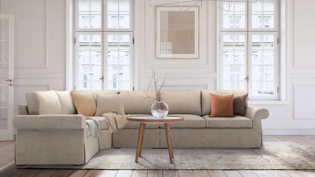Modern Victorian living room with Pottery Barn Pearce Roll Arm sofa in Performance Weave Cream slipcover