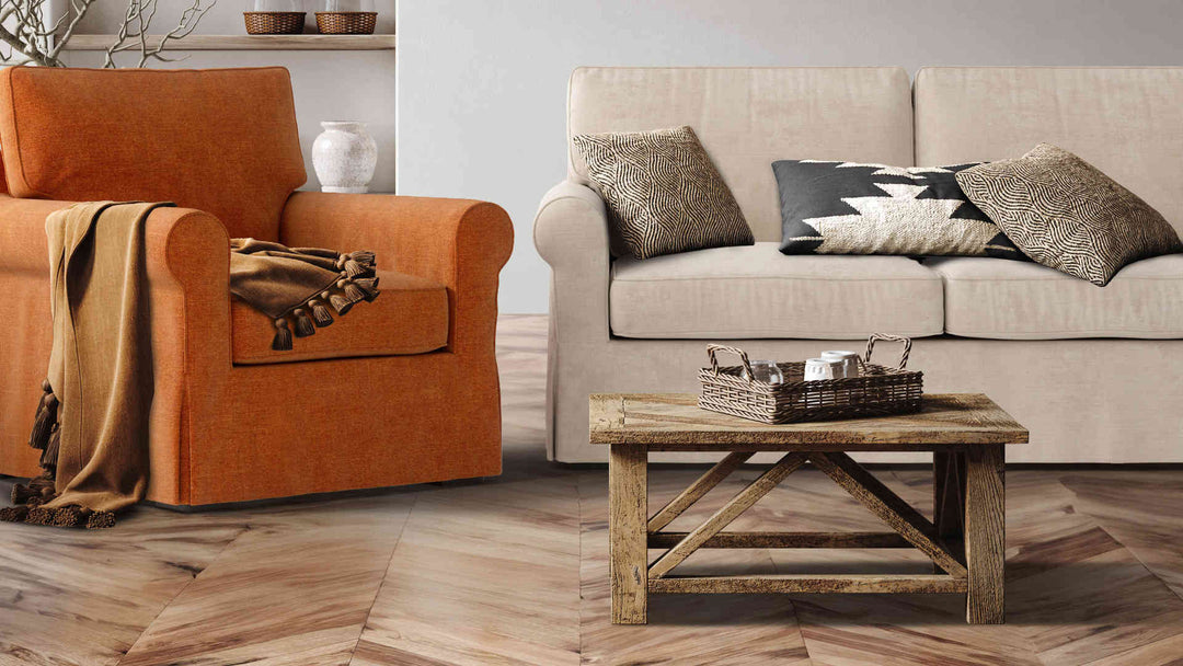 Rustic living room with Pottery Barn Buchanan Roll Arm sofa in Performance Weave Cream and Comfort Chenille Burnt Orange slipcover