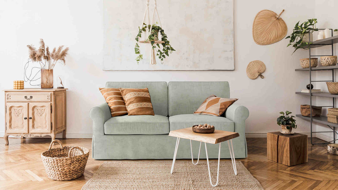 Scandinavian living room with Pottery Barn Buchanan Roll Arm sofa in Performance Weave Stone slipcover