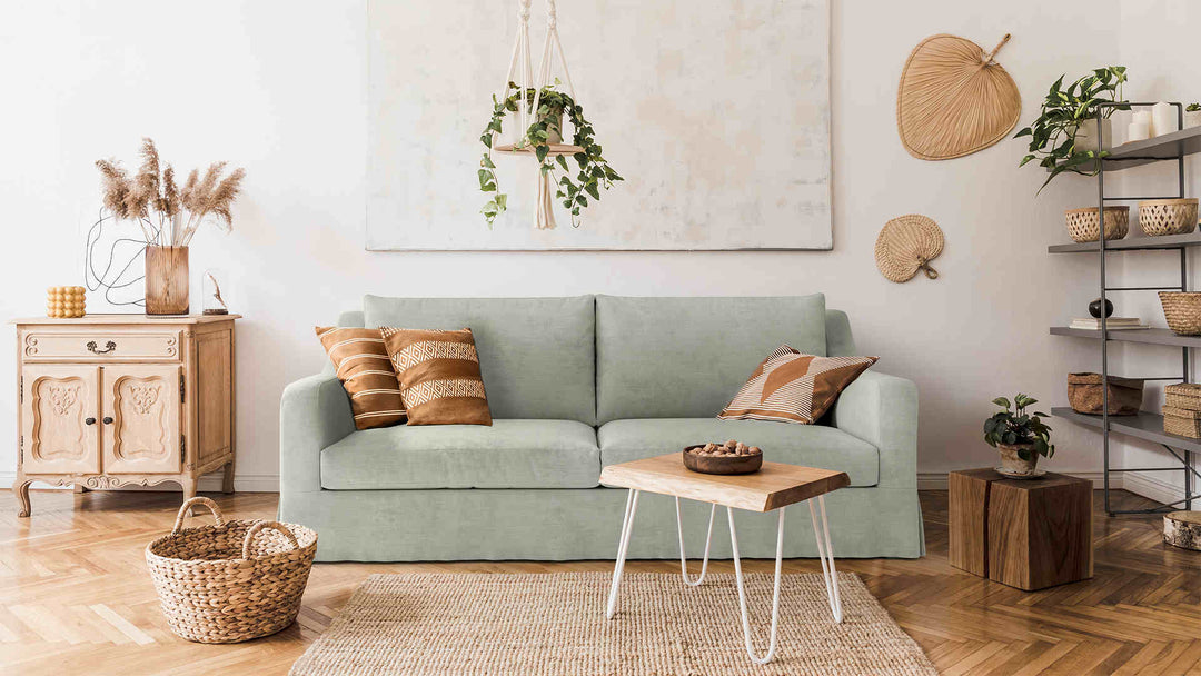 Scandinavian living room with Crate and Barrel Verrano II Slope Arm sofa in Performance Weave Stone slipcover