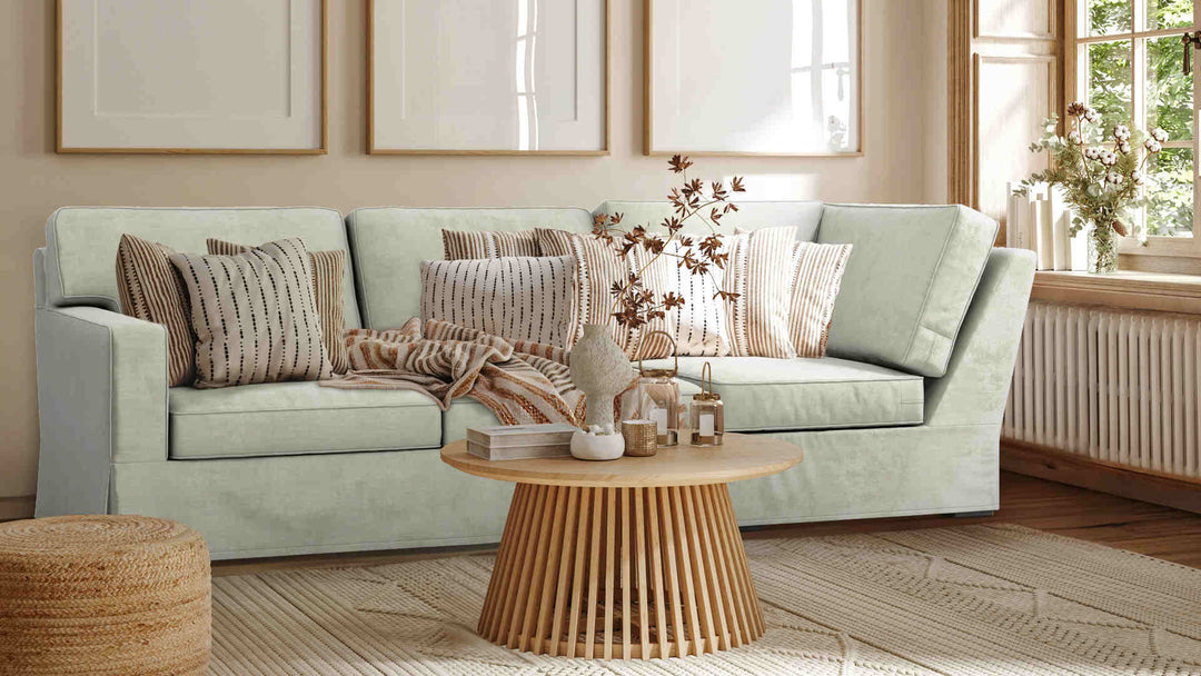 Nordic Minimalist living room with Crate and Barrel Axis II sofa in Performance Weave Stone slipcover