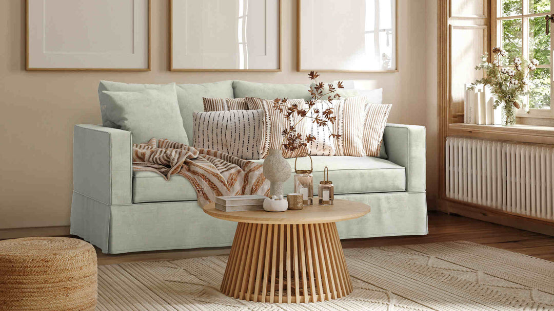 Nordic Minimalist living room with Crate and Barrel Willow sofa in Performance Weave Stone slipcover