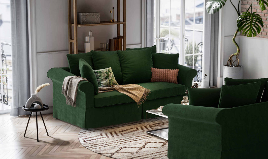 Nordic Minimalist living room with Crate and Barrel Bloomsbury sofa in Classic Velvet Forest Green slipcover