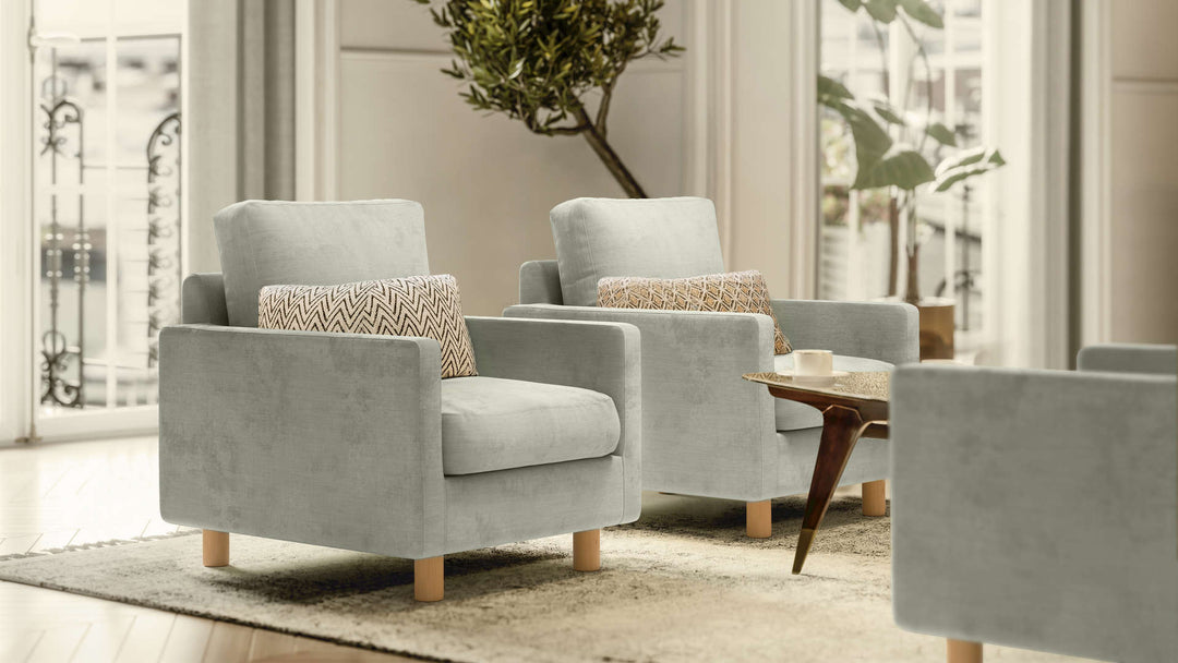 Scandinavian living room with Muji Slim Arm Sofa in Performance Weave Stone slipcover