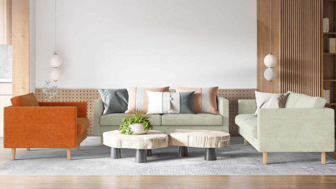 Modern living room with Muji Sofa 2005 sofa in Performance Weave Stone and Comfort Chenille Burnt Orange slipcover