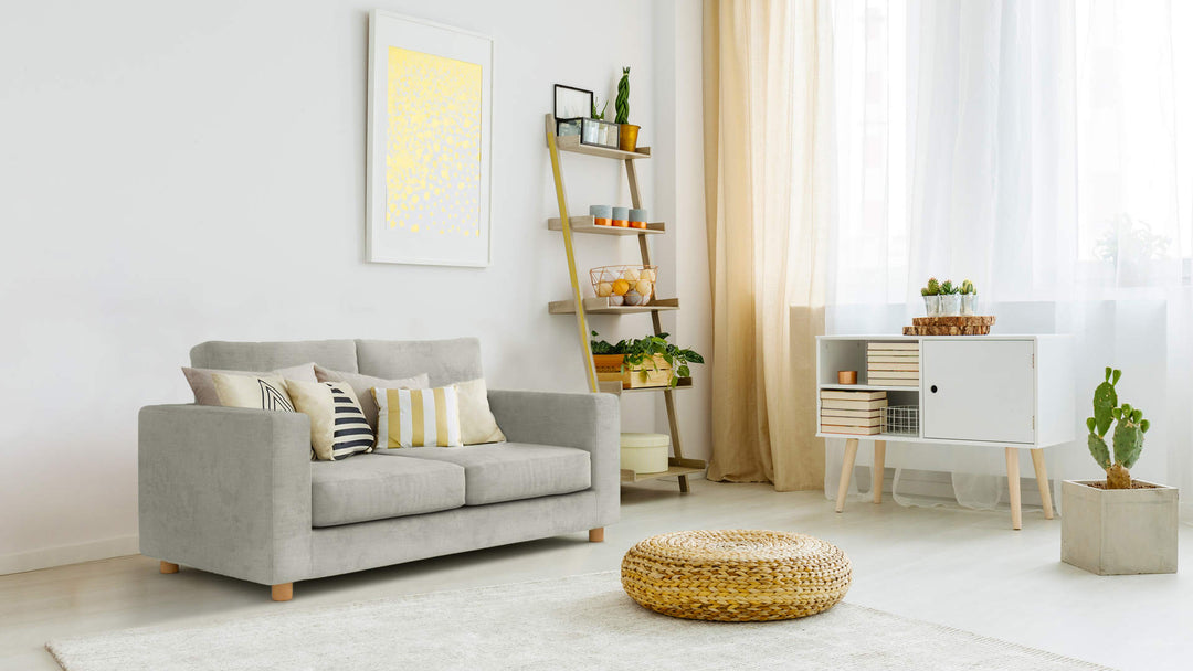 Bohemian living room with Muji Sofa 1996 in Performance Weave Stone fabric slipcover