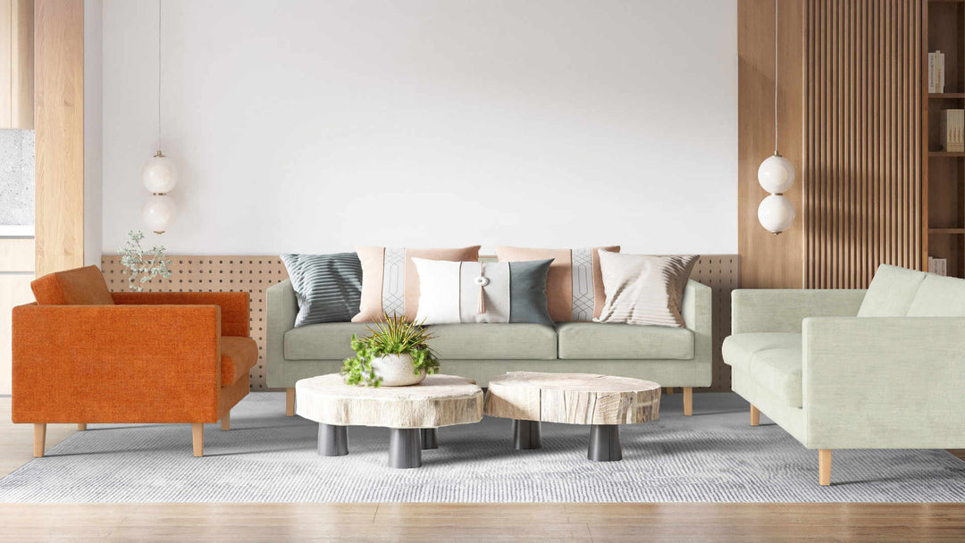 Modern living room with Muji Sofa 2005 sofa in Performance Weave Stone and Comfort Chenille Burnt Orange slipcover