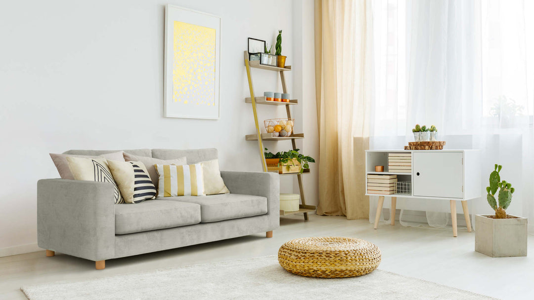 Bohemian living room with Muji Sofa 1996 in Performance Weave Stone fabric slipcover