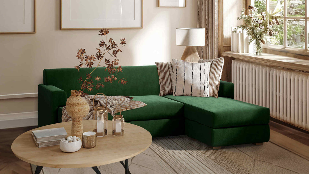 Nordic Minimalist living room with Muji Sectional Sofa in Classic Velvet Forest Green slipcover
