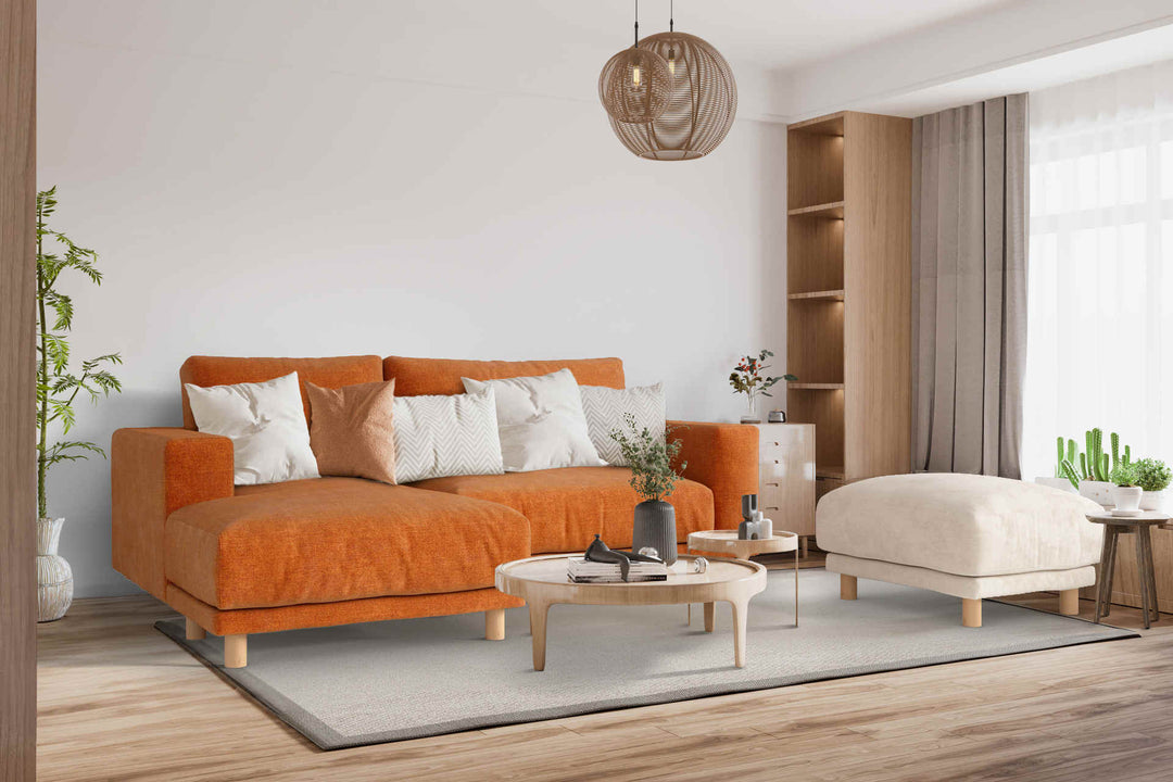 Japandi living room with Muji Wide Arm sofa in Comfort Chenille Burnt Orange and Performance Weave Cream slipcover