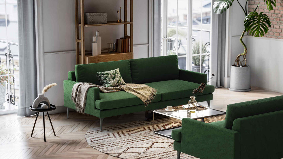 Nordic Minimalist living room with West Elm Andes sofa in Classic Velvet Forest Green slipcover