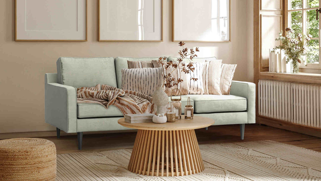 Nordic Minimalist living room with West Elm Drake sofa in Performance Weave Stone slipcover