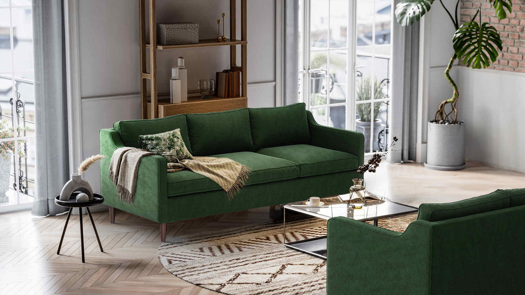 Nordic Minimalist living room with West Elm Hamilton sofa in Classic Velvet Forest Green slipcover