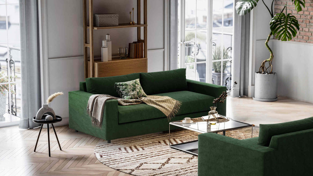 Nordic Minimalist living room with West Elm Urban sofa in Classic Velvet Forest Green slipcover