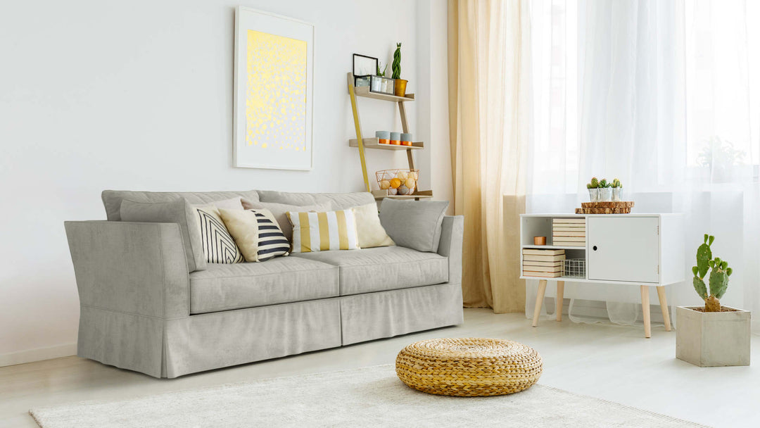 Bohemian living room with Rowe Darby sofa in Performance Weave Stone fabric slipcover