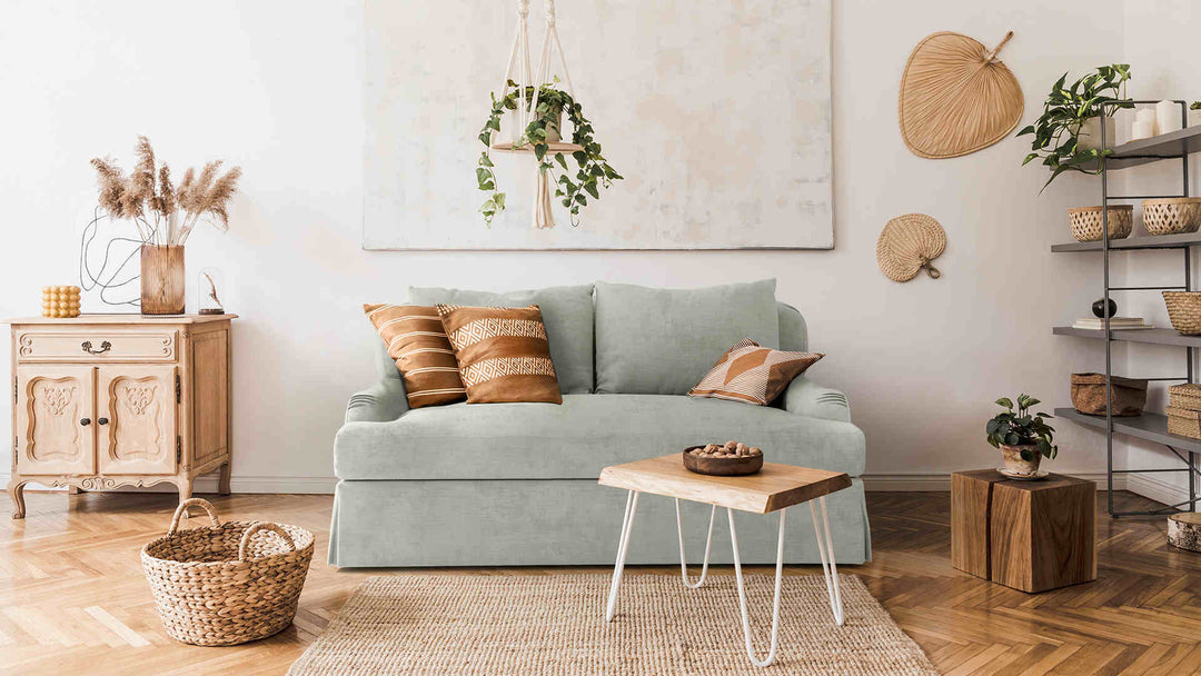 Scandinavian living room with Restoration Hardware Belgian Classic Roll Arm sofa in Performance Weave Stone slipcover