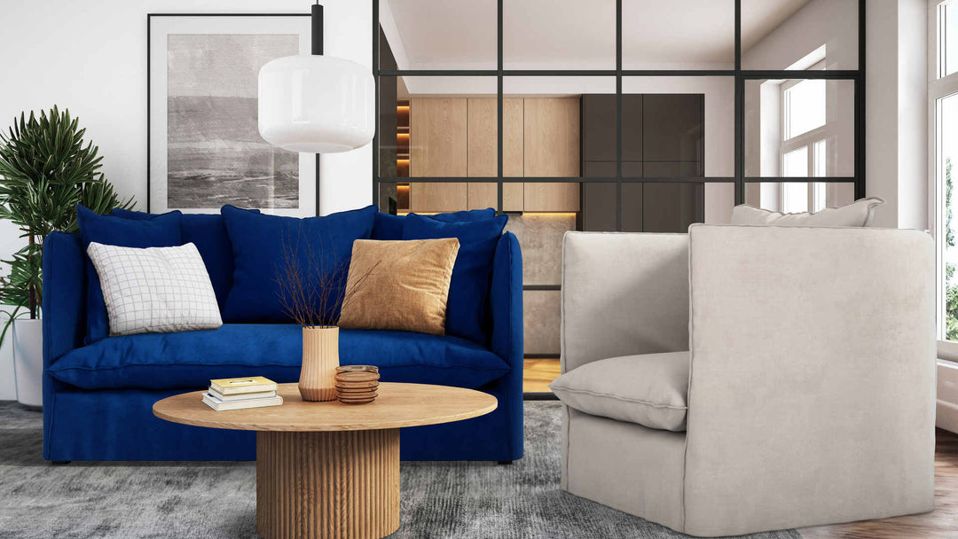 Modern living room with Maison du Monde Louvain sofa in Classic Velvet Cobalt and Performance Weave Cream slipcover