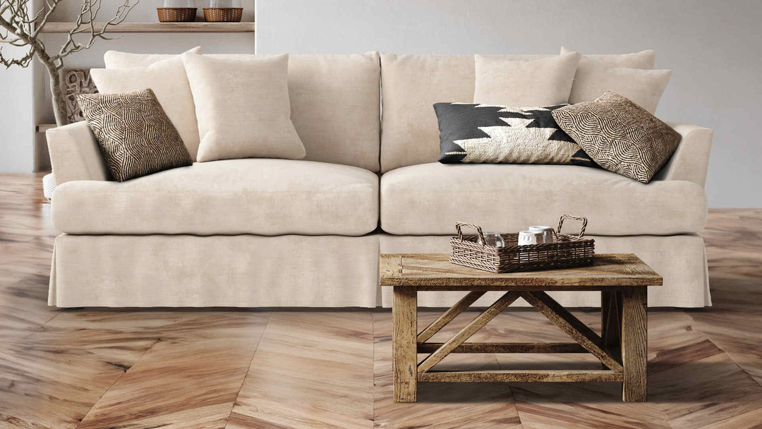 Rustic living room with Arhaus Emory sofa in Performance Weave Cream slipcover