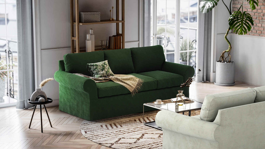 Nordic Minimalist living room with Ethan Allen Bennett Roll-Arm sofa in Performance Weave Stone and Classic Velvet Forest Green slipcover