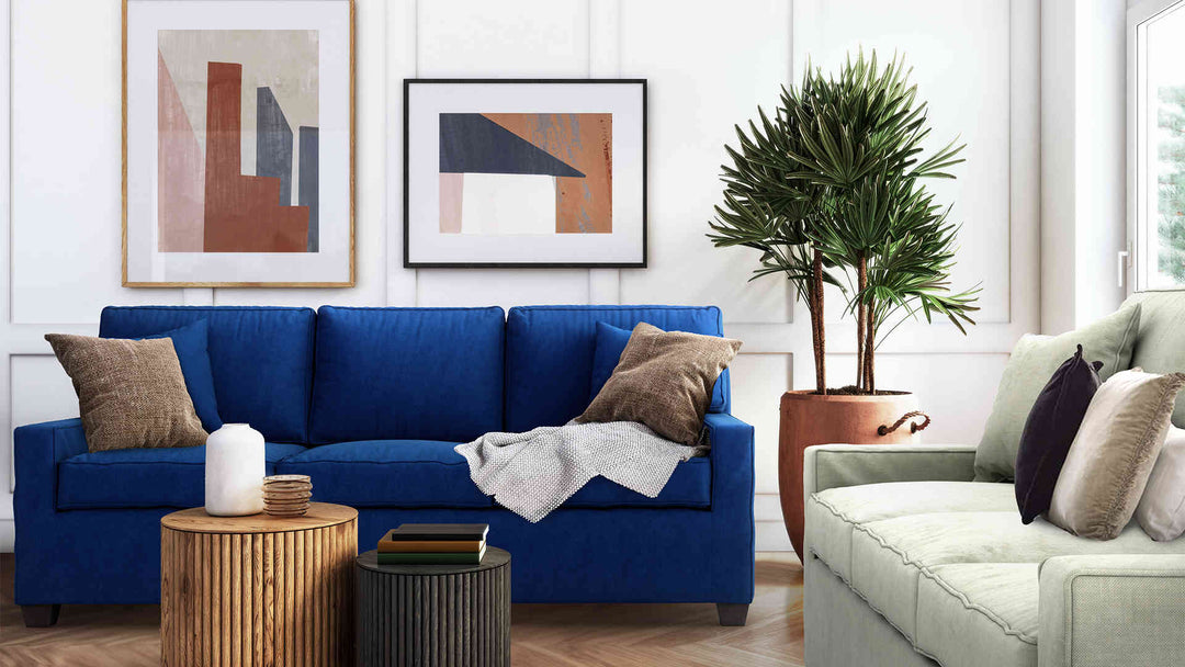 Modern Victorian living room with Ethan Allen Bennett Track Arm sofa in Classic Velvet Cobalt and Performance Weave Stone slipcover