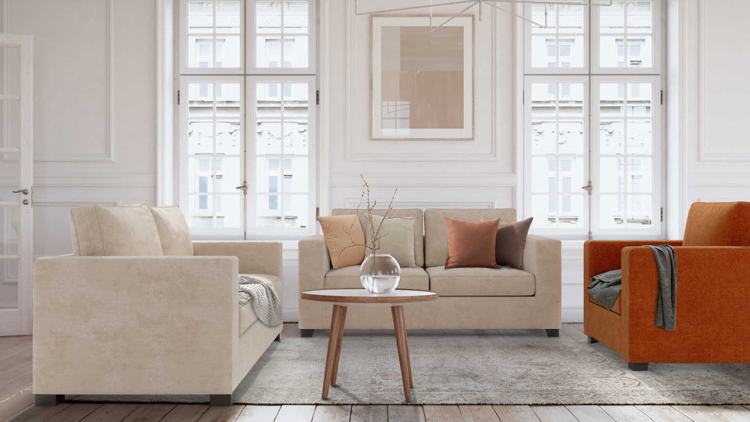 Modern Victorian living room with Maison du Monde Milano sofa in Performance Weave Cream and Comfort Chenille Burnt Orange slipcover