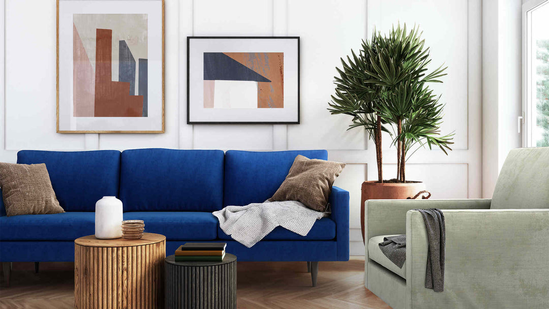 Modern Victorian living room with Room and Board Jasper sofa in Classic Velvet Cobalt and Performance Weave Stone slipcover