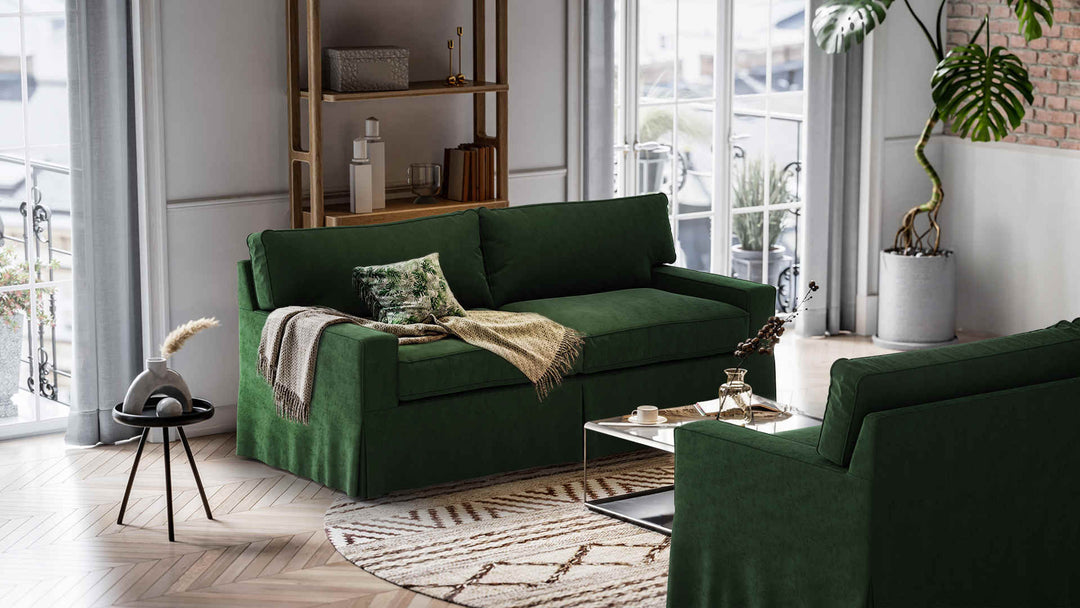 Nordic Minimalist living room with Mitchell Gold + Bob Williams Alex II sofa in Classic Velvet Forest Green slipcover