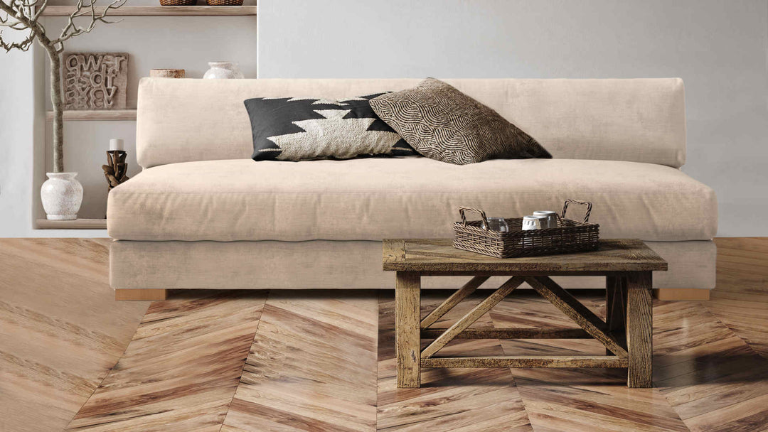 Rustic living room with CB2 Piazza sofa in Performance Weave Cream slipcover