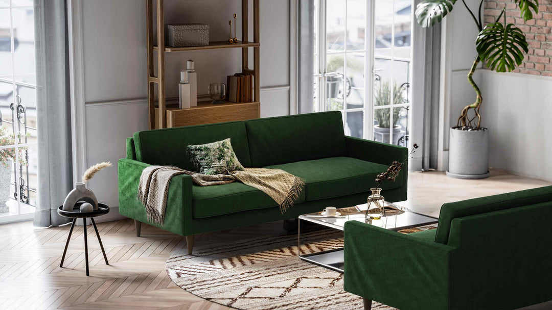 Nordic Minimalist living room with Joybird Eliot sofa in Classic Velvet Forest Green slipcover