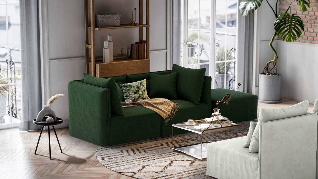 Nordic Minimalist living room with Elbgestoeber Elbdock sofa in Performance Weave Stone and Classic Velvet Forest Green slipcover