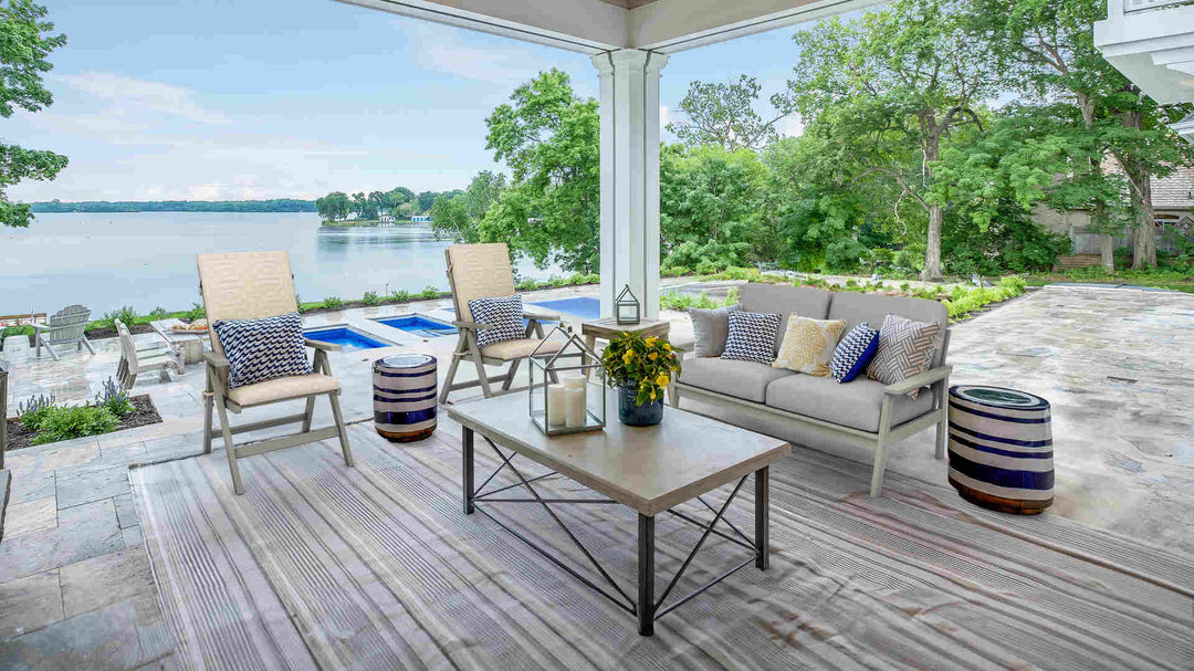 Lake view porch with IKEA Bondholmen sofa in Sunbrella Fretwork Flax and Performance Canvas Ash slipcover