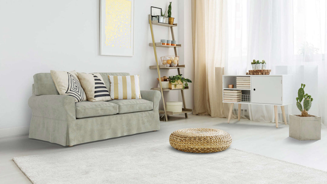 Bohemian living room with Laura Ashley Padstow sofa in Performance Weave Stone fabric slipcover
