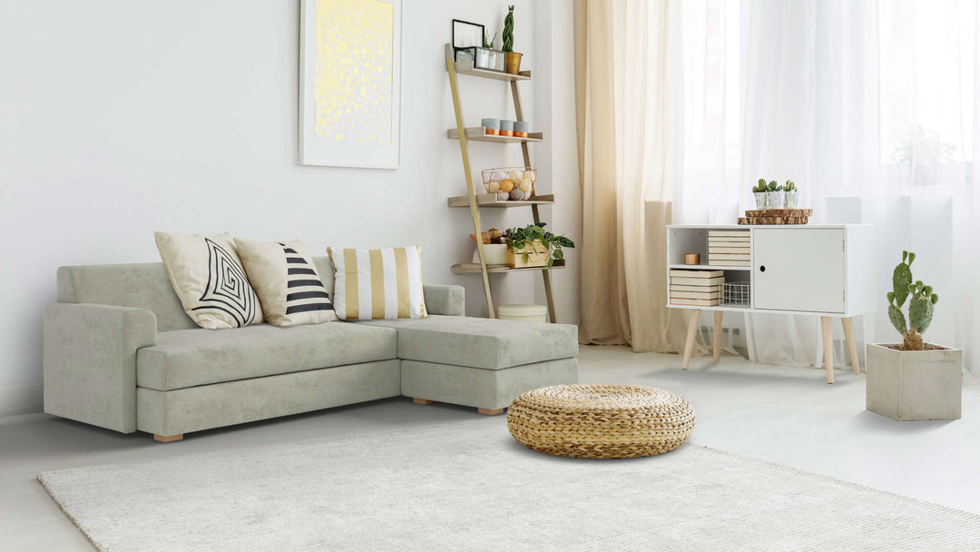 Bohemian living room with Muji Sectional Sofa in Performance Weave Stone fabric slipcover