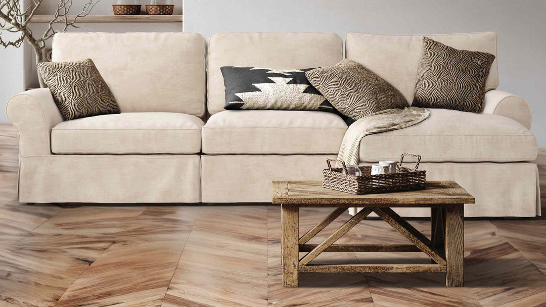 Rustic living room with Pottery Barn PB Basic sofa in Performance Weave Cream slipcover