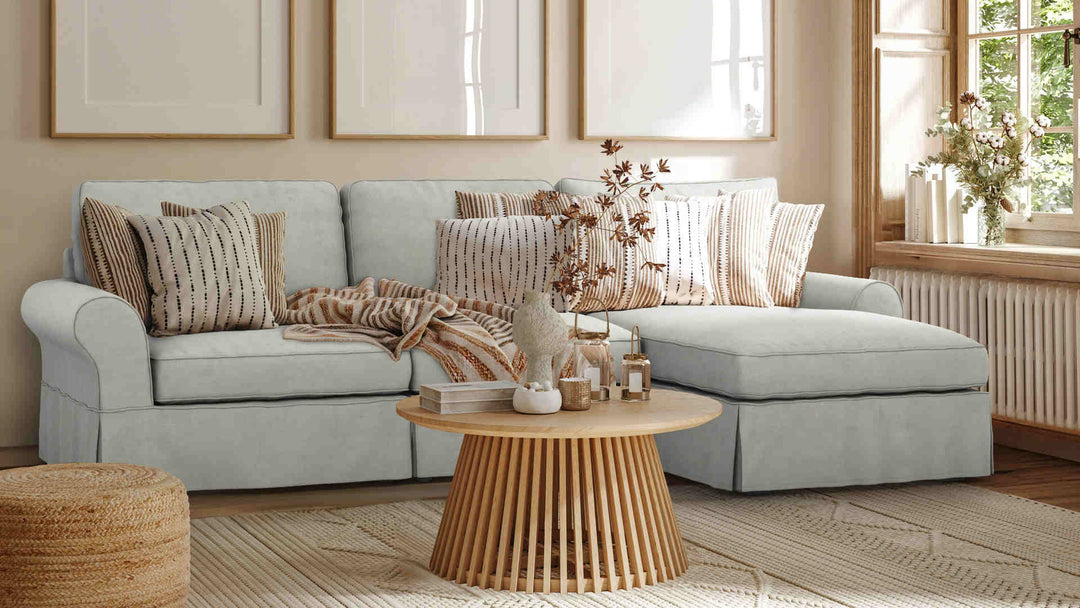 Nordic Minimalist living room with Pottery Barn PB Basic sofa in Performance Weave Stone slipcover